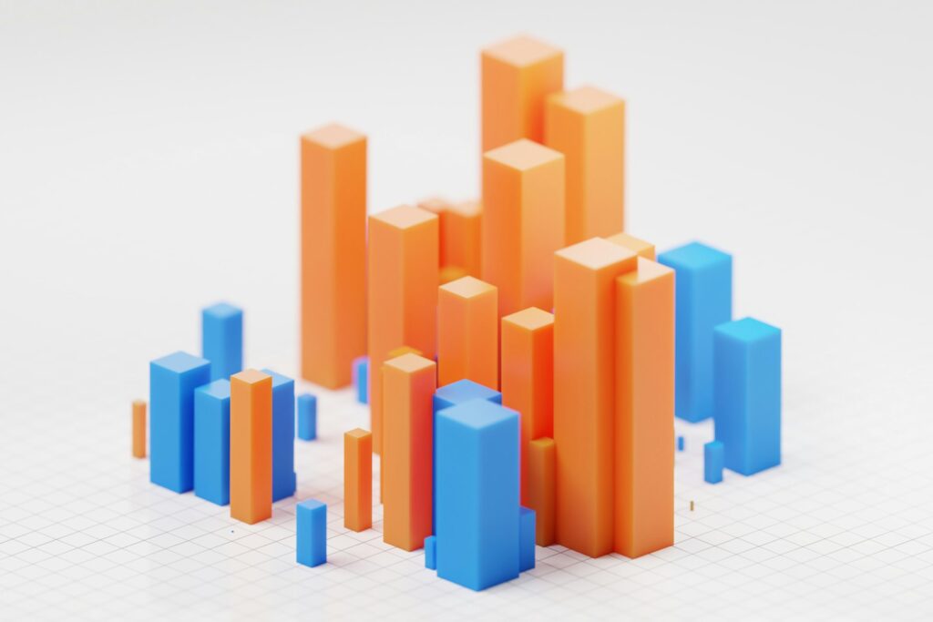 Dreidimensionales Balkendiagramm in Orange und Blau als Sinnbild für messbare Key Results